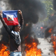 Haiti tone v anarhijo: moč tolp se krepi, zdravniki pobegnili