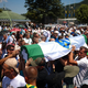 V Srebrenici pokopali še 14 žrtev, Slovenija poudarja pomen sprave