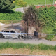 Foto: V Šiški ukraden avto je pogorel ob tirih v bližini Žaka