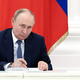 Putin zagrozil "vsem, ki skušajo razdeliti rusko družbo"