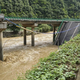11 mrtvih v zrušenju mosta. Kitajska se spopada z močnim deževjem.