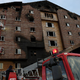 Zaradi smrtonosnega požara v hotelu aretirali 19 ljudi